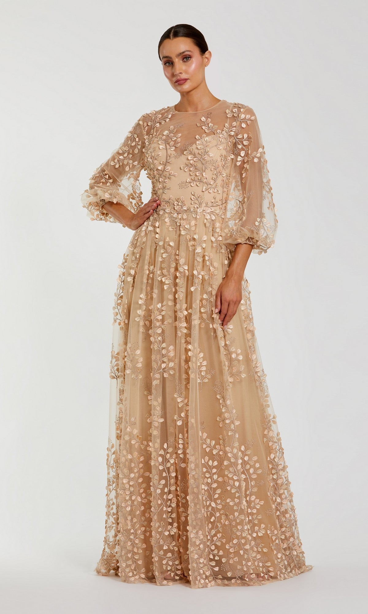 A woman wears a Mac Duggal 79399 long sleeve blue formal dress, standing against a plain background.